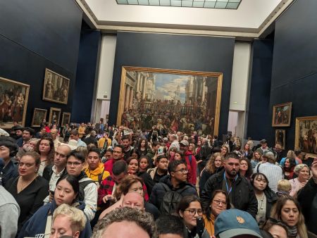 Louvre Visitors Waiting Their Turn To See The Mona Lisa