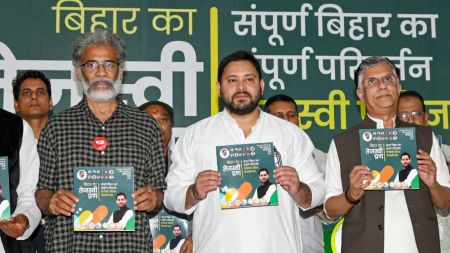 Mahagathbandhan leaders releasing their Bihar election manifesto promising jobs and welfare.