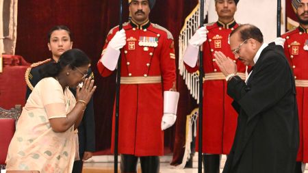 Justice Surya Kant greeting President Droupadi Murmu during his oath ceremony at Rashtrapati Bhavan.