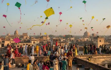 Crowds flying kites on rooftops in Lahore during Basant celebrations