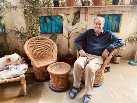 Mark Tully at home in Delhi courtyard
