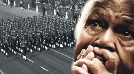 Elderly Indian watching Republic Day parade in reflection