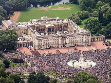 Aerial view of Buckingham Palace with crowds gathered outside